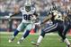 Sep 22, 2013; Arlington, TX, USA; Dallas Cowboys receiver Dez Bryant (88) runs with the ball after a catch against St. Louis Rams safety Rodney McLeod (23) in the third quarter at AT&T Stadium. The Dallas Cowboys beat St. Louis Rams 31-7. Mandatory Credit
