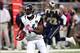 Oct 6, 2013; St. Louis, MO, USA; Jacksonville Jaguars wide receiver Justin Blackmon (14) carries the ball for a touchdown during the first quarter against the St. Louis Rams at The Edward Jones Dome. Mandatory Credit: Scott Kane-USA TODAY Sports