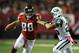 Oct 7, 2013; Atlanta, GA, USA; Atlanta Falcons tight end Tony Gonzalez (88) stiff arms New York Jets safety Dawan Landry (26) during the second half at the Georgia Dome. The Jets defeated the Falcons 30-28. Mandatory Credit: Dale Zanine-USA TODAY Sports