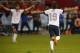 KANSAS CITY, KS - OCTOBER 11: Graham Zusi #19 of the U.S. Men's National Soccer Team celebrates after scoring the first goal of the game against Jamaica midway in the second half at Sporting Park on October 11, 2013 in Kansas City, Kansas. (Photo by Kyl