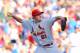 Aug 17, 2013; Chicago, IL, USA; St. Louis Cardinals relief pitcher Seth Maness (61) throws a pitch during the seventh inning against the Chicago Cubs at Wrigley Field. St. Louis won 4-0. Mandatory Credit: Dennis Wierzbicki-USA TODAY Sports