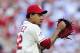 Oct 12, 2013; St. Louis, MO, USA; St. Louis Cardinals relief pitcher Carlos Martinez (62) reacts after retiring the Los Angeles Dodgers during the 8th inning in game two of the National League Championship Series baseball game at Busch Stadium. Mandatory