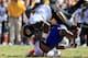 GAINESVILLE, FL - NOVEMBER 03: Gahn McGaffie #3 of the Missouri Tigers is tackled by Josh Evans #9 of the Florida Gators during the game at Ben Hill Griffin Stadium on November 3, 2012 in Gainesville, Florida. (Photo by Sam Greenwood/Getty Images)