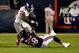 CHICAGO, IL - OCTOBER 10: Running back Brandon Jacobs #34 of the New York Giants is tackled by middle linebacker D.J. Williams #58 of the Chicago Bears during a game at Soldier Field on October 10, 2013 in Chicago, Illinois. (Photo by Jonathan Daniel/Get