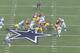 Hatcher bears down on Morris before dropping him for a loss.