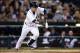 Sep 17, 2013; Detroit, MI, USA; Detroit Tigers shortstop Jose Iglesias (1) bunts for a base hit in the fifth inning against the Seattle Mariners at Comerica Park. Mandatory Credit: Rick Osentoski-USA TODAY Sports