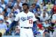 LOS ANGELES, CA - OCTOBER 15: Hanley Ramirez #13 of the Los Angeles Dodgers reacts after striking out in the first inning against the St. Louis Cardinals in Game Four of the National League Championship Series at Dodger Stadium on October 15, 2013 in Los