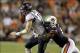 Ole Miss QB Bo Wallace (left) sacked by Auburn DE Carl Lawson