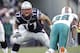 FOXBORO, MA - DECEMBER 24: Nate Solder #77 of the New England Patriots prepares to block Jason Taylor #99 of the Miami Dolphins during the second half of New England's 27-24 win at Gillette Stadium on December 24, 2011 in Foxboro, Massachusetts. (Photo