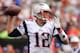 CINCINNATI, OH - OCTOBER 6: Quarterback Tom Brady #12 of the New England Patriots passes against the Cincinnati Bengals in the first quarter at Paul Brown Stadium on October 6, 2013 in Cincinnati, Ohio. (Photo by Jamie Sabau/Getty Images)