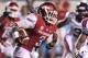 Sep 7, 2013; Little Rock, AR, USA; Arkansas Razorbacks running back Alex Collins (3) rushes against the Samford Bulldogs during the second half at War Memorial Stadium. Arkansas defeated Samford 31-21. Mandatory Credit: Nelson Chenault-USA TODAY Sports
