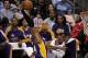 January 4, 2013; Los Angeles, CA, USA; Los Angeles Lakers shooting guard Kobe Bryant (24) dunks over Los Angeles Clippers point guard Chris Paul (3) during the game at the Staples Center. Clippers won 107-102. Mandatory Credit: Jayne Kamin-Oncea-USA T