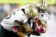 FOXBORO, MA - OCTOBER 13: Danny Amendola #80 of the New England Patriots is hit by Rafael Bush #25 and Keyunta Dawson #55 of the New Orleans Saints at Gillette Stadium on October 13, 2013 in Foxboro, Massachusetts.The New England Patriots defeated the