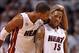 Jun 3, 2013; Miami, FL, USA; Miami Heat center Chris Bosh (1) reacts to teammate Mario Chalmers (15) against the Indiana Pacers in the third quarter during game 7 of the 2013 NBA Eastern Conference Finals at American Airlines Arena. Mandatory Credit: Stev