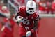 LOUISVILLE, KY - SEPTEMBER 21: Senorise Perry #32 of the Louisville Cardinals runs the football against the Florida International Panthers at Papa John's Cardinal Stadium on September 21, 2013 in Louisville, Kentucky. (Photo by John Sommers II/Getty Imag