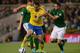 DUBLIN, IRELAND - SEPTEMBER 06: Zlatan Ibrahimovic of Republic of Ireland battles with Marc Wilson of Sweden during the FIFA 2014 World Cup Qualifying Group C match between Republic of Ireland and Sweden at Aviva Stadium on September 6, 2013 in Dublin, I