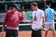 May 22, 2013; Paris, FRANCE; Tennis coach Paul Annacone (left) talks with Roger Federer (SUI) during a practice session in advance of the 2013 French Open at Roland Garros. Mandatory Credit: Pierre Lahalle/Presse Sports via USA TODAY Sports