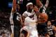 `MIAMI, FL - JUNE 18: LeBron James #6 of the Miami Heat attempts a pass while being contested by Tim Duncan #21 and Kawhi Leonard #2 of the San Antonio Spurs during Game Six of the 2013 NBA Finals on June 18, 2013 at the American Airlines Arena in Miami,