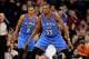 Jan. 14, 2013; Phoenix, AZ, USA; Oklahoma City Thunder forward Kevin Durant (35) and guard Russell Westbrook (0) play defense in the game against the Phoenix Suns at the US Airways Center. The Thunder defeated the Suns 102-90. Mandatory Credit: Jennifer S