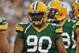 GREEN BAY, WI - AUGUST 09: B.J. Raji #90 of the Green Bay Packers awaits the start of play against the Arizona Cardinals at Lambeau Field on August 9, 2013 in Green Bay, Wisconsin. The Cardinals defeated the Packers 17-0. (Photo by Jonathan Daniel/Getty