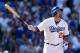 LOS ANGELES, CA - OCTOBER 16: Adrian Gonzalez #23 of the Los Angeles Dodgers hits a solo home run in the third inning against the St. Louis Cardinals in Game Five of the National League Championship Series at Dodger Stadium on October 16, 2013 in Los Ang