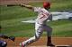 October 16, 2013; Los Angeles, CA, USA; St. Louis Cardinals left fielder Matt Holliday (7) hits a single in the first inning against the Los Angeles Dodgers in game five of the National League Championship Series baseball game at Dodger Stadium. Mandatory