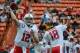 January 27, 2013; Honolulu, HI, USA; AFC quarterback Andrew Luck of the Indianapolis Colts (12) and AFC quarterback Peyton Manning of the Denver Broncos (18) pass the ball during warm ups before the 2013 Pro Bowl against the NFC at Aloha Stadium. Mandator
