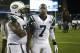 FOXBORO, MA - SEPTEMBER 12: Geno Smith #7 of the New York Jets is consoled by Damon Harrison #94 after a loss to the New England Patriots at Gillette Stadium on September 12, 2013 in Foxboro, Massachusetts. (Photo by Jim Rogash/Getty Images)