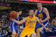 BEIJING, CHINA - OCTOBER 15: Steve Blake #5 of the Los Angeles Lakers drives against David Lee #42 of the Golden State Warriors during the 2013 Global Games on October 15, 2013 at the MasterCard Center in Beijing, China. NOTE TO USER: User expressly ackno