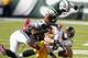 Oct 13, 2013; East Rutherford, NJ, USA; Pittsburgh Steelers tight end Heath Miller (83) is tackled by New York Jets inside linebacker David Harris (52) and free safety Antonio Allen (39) during the game at MetLife Stadium. Mandatory Credit: William Perlma