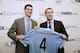 HONG KONG - JULY 26:( L to R) Gain Capital Regional Director Shane Braunstein and Manchester City's Operational Officer, Tom Glick hold up a Manchester City tops during a Manchester City Sponsorship launch with Gain Capital at the JW Marriot on July 26, 2