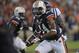 Oct 5, 2013; Auburn, AL, USA; Auburn Tigers quarterback Nick Marshall (14) runs the ball during the first quarter against the Mississippi Rebels at Jordan Hare Stadium. Mandatory Credit: Shanna Lockwood-USA TODAY Sports