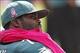 Oct 13, 2013; Tampa, FL, USA; Philadelphia Eagles quarterback Michael Vick (7) looks on from the bench as he wears pink in honor of breast cancer awareness during the second half at Raymond James Stadium. Philadelphia Eagles defeated the Tampa Bay Buccane