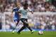 LONDON, ENGLAND - SEPTEMBER 28: Paulinho of Tottenham Hotspur is chased by Andre Schurrle of Chelsea during the Barclays Premier League match between Tottenham Hotspur and Chelsea at White Hart Lane on September 28, 2013 in London, England. (Photo by Cl