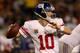 CHICAGO, IL - OCTOBER 10: Quarterback Eli Manning #10 of the New York Giants drops back to pass against the Chicago Bears during a game at Soldier Field on October 10, 2013 in Chicago, Illinois. (Photo by Jonathan Daniel/Getty Images)