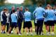 MANCHESTER, ENGLAND - AUGUST 16: Manager Manuel Pellegrini (C) of Manchester City speaks to his players during a Manchester City open training session at their Carrington Training Complex on August 16, 2013 in Manchester, England. (Photo by Paul Thomas/Ge