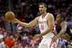 HOUSTON, TX - OCTOBER 05: Omri Casspi #18 of the Houston Rockets dribbles againstt Lance Thomas #42 of the New Orleans Pelicans in a preseason NBA game on October 5, 2013 at Toyota Center in Houston, Texas. The Pelicans won 116 to 115. NOTE TO USER: User