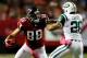ATLANTA, GA - OCTOBER 07: Tight end Tony Gonzalez #88 of the Atlanta Falcons runs with the ball as strong safety Dawan Landry #26 of the New York Jets defends during their game at the Georgia Dome on October 7, 2013 in Atlanta, Georgia. (Photo by Kevin