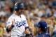 LOS ANGELES, CA - OCTOBER 15: Andre Ethier #16 of the Los Angeles Dodgers celebrates with manager Don Mattingly #8 after Ethier scores a run in the fourth inning against the St. Louis Cardinals in Game Four of the National League Championship Series at D