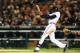 DETROIT, MI - OCTOBER 16: Austin Jackson #14 of the Detroit Tigers hits an RBI single scoring Omar Infante #4 in the fourth inning against the Boston Red Sox during Game Four of the American League Championship Series at Comerica Park on October 16, 2013