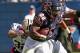 CHICAGO, IL - OCTOBER 06: Matt Forte #22 of the Chicago Bears breaks away from Kenny Vaccaro #32 of the New Orleans Saints at Soldier Field on October 6, 2013 in Chicago, Illinois. The Saints defeated the Bears 26-18. (Photo by Jonathan Daniel/Getty Ima