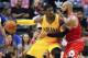 INDIANAPOLIS, IN - OCTOBER 05: Roy Hibbert #55 of the Indiana Pacers dribbles the ball against Carlos Boozer #5 of the Chicago Bulls during action on October 5, 2013 at Bankers Life Fieldhouse in Indianapolis, Indiana. Chicago defeated Indiana 82-76. NOTE