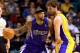 LAS VEGAS, NV - OCTOBER 10: DeMarcus Cousins #15 of the Sacramento Kings drives against Pau Gasol #16 of the Los Angeles Lakers during their preseason game at the MGM Grand Garden Arena on October 10, 2013 in Las Vegas, Nevada. Sacramento won 104-86. NOT