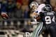 SEATTLE - JANUARY 06: Quarterback Tony Romo #9 of the Dallas Cowboys is taken down by Bryce Fisher #94 of the Seattle Seahawks near the Cowboys goal line in the second half of the NFC Wild Card Playoff Game on January 6, 2007 at Qwest Field in Seattle, W