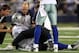 ARLINGTON, TX - OCTOBER 25: Quarterback Tony Romo #9 of the Dallas Cowboys lies on the field after a left shoulder injury in the second quarter against the New York Giants at Cowboys Stadium on October 25, 2010 in Arlington, Texas. (Photo by Ronald Mart