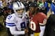 LANDOVER, MD - DECEMBER 30: Quarterbacks Tony Romo #9 of the Dallas Cowboys and Robert Griffin III #10 of the Washington Redskins talk following the Redskins 28-18 win at FedExField on December 30, 2012 in Landover, Maryland. (Photo by Rob Carr/Getty Ima