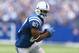 INDIANAPOLIS, IN - SEPTEMBER 15: Reggie Wayne #87 of the Indianapolis Colts runs with the ball during the NFL game against the Miami Dolphins at Lucas Oil Stadium on September 15, 2013 in Indianapolis, Indiana. (Photo by Andy Lyons/Getty Images)