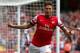 LONDON, ENGLAND - AUGUST 17: Olivier Giroud of Arsenal celebrates after scoring the opening goal during the Barclays Premier League match between Arsenal and Aston Villa at Emirates Stadium on August 17, 2013 in London, England. (Photo by Clive Mason/Ge