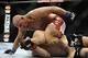 Jan 26, 2013; Chicago, IL, USA; Mike Russow (bottom) defends himself against Shawn Jordan (top) during UFC on FOX 6 at the United Center. Mandatory Credit: David Banks-USA TODAY Sports