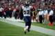 HOUSTON, TX - OCTOBER 13: Alec Ogletree #52 of the St. Louis Rams returns an interception 98 yards for a touchdown in the third quarter against the Houston Texans at Reliant Stadium on October 13, 2013 in Houston, Texas. (Photo by Scott Halleran/Getty I